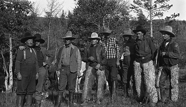 Peel : University of Lethbridge, [Cowboys standing near forest] (1910-1945)